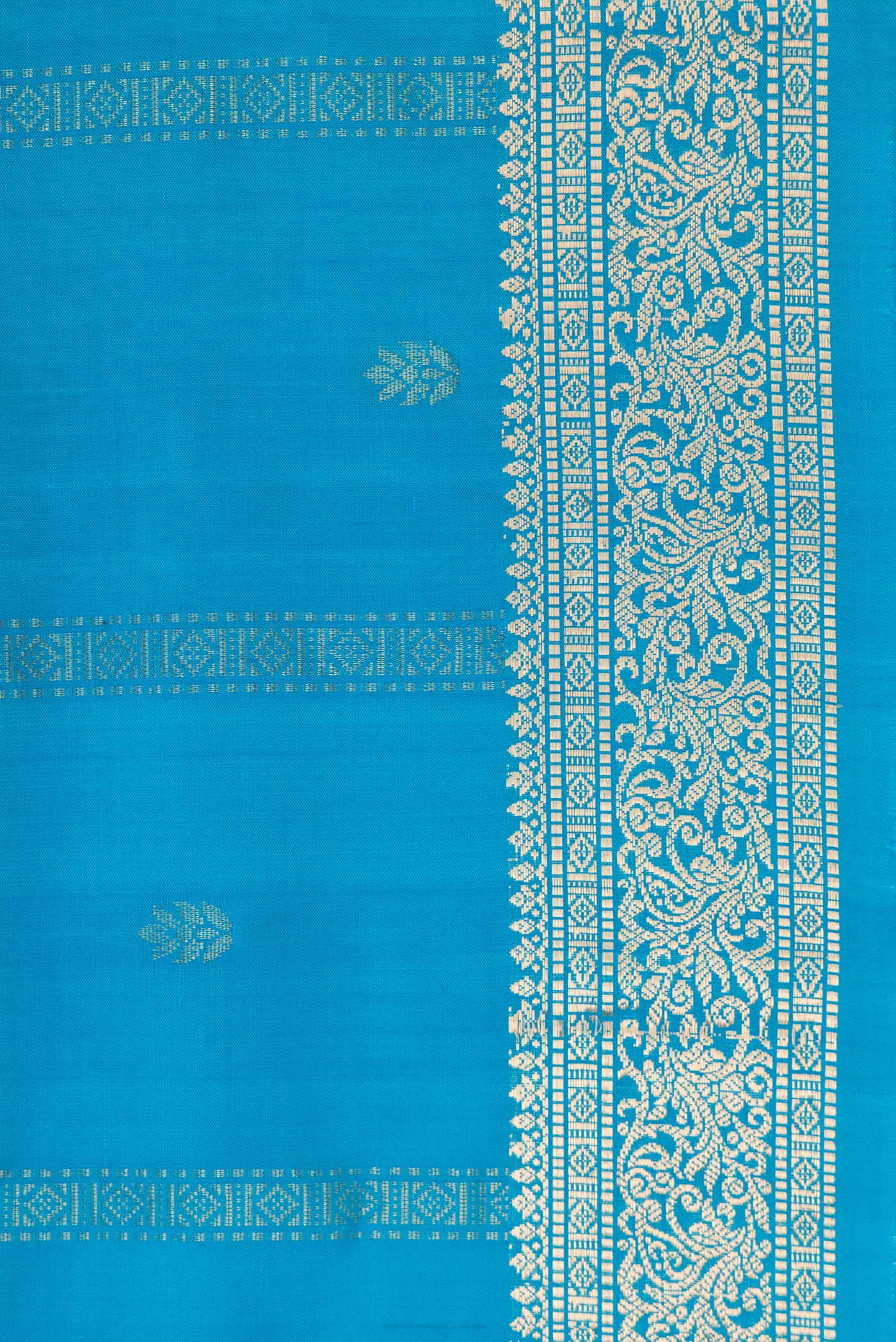 Border image of Sky Blue Dual Tone Soft Silk Saree with Zari Butta on the body and Zari Border. 