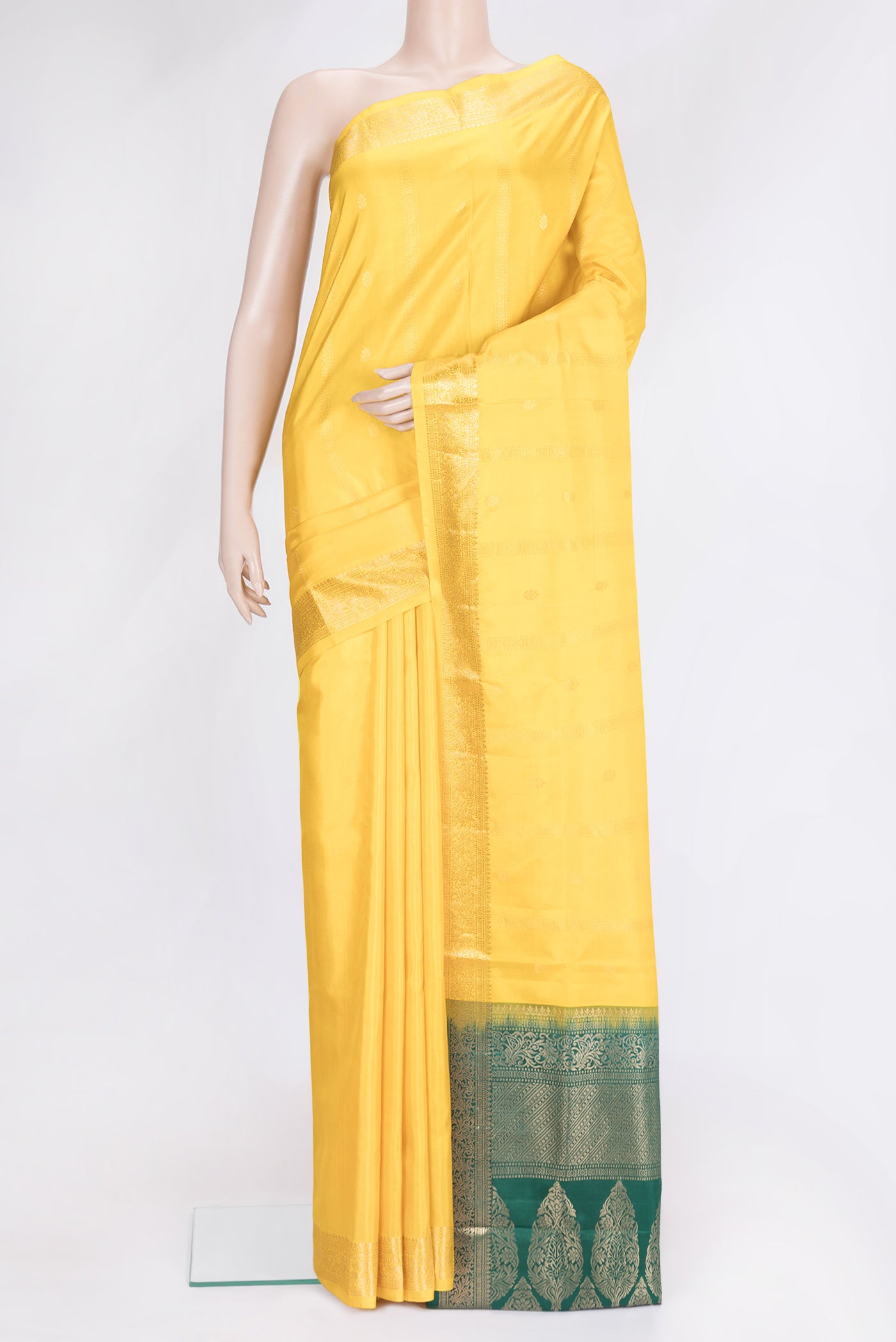 Yellow Dual Tone Soft Silk Saree with Zari Butta on the body and Zari Border.  displayed on a mannequin