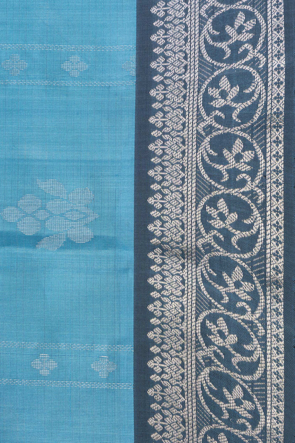 Border image of Sky Blue Dual Tone Soft Silk Saree with Zari Butta on the body and Zari Border. 