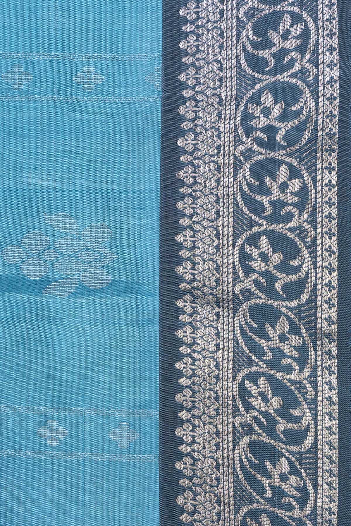 Border image of Sky Blue Dual Tone Soft Silk Saree with Zari Butta on the body and Zari Border. 
