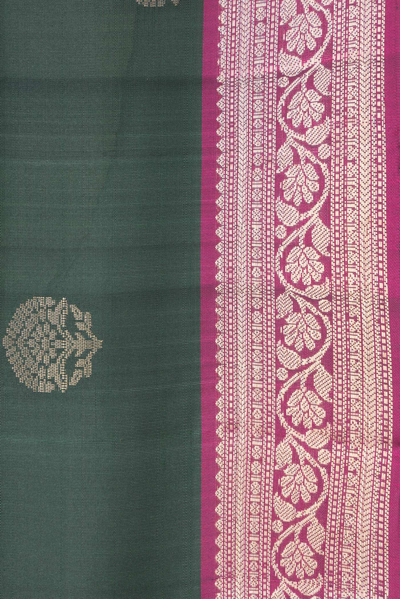 Border image of Bottle Green Dual Tone Soft Silk Saree with Zari Butta on the body and Zari Border. 