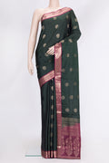 Bottle Green Dual Tone Soft Silk Saree with Zari Butta on the body and Zari Border.  displayed on a mannequin
