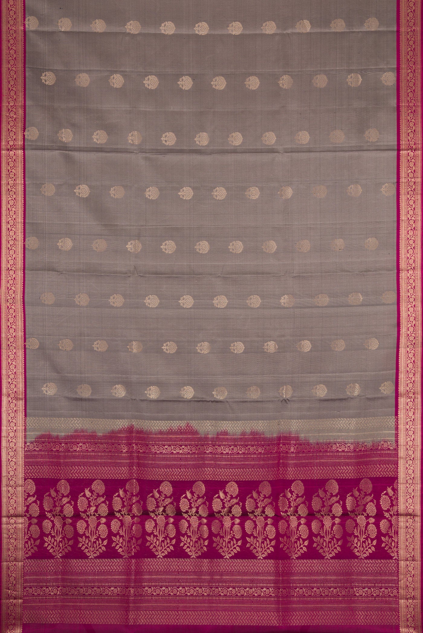 Flat view of Grey Dual Tone Soft Silk Saree with Zari Butta on the body and Zari Border. 
