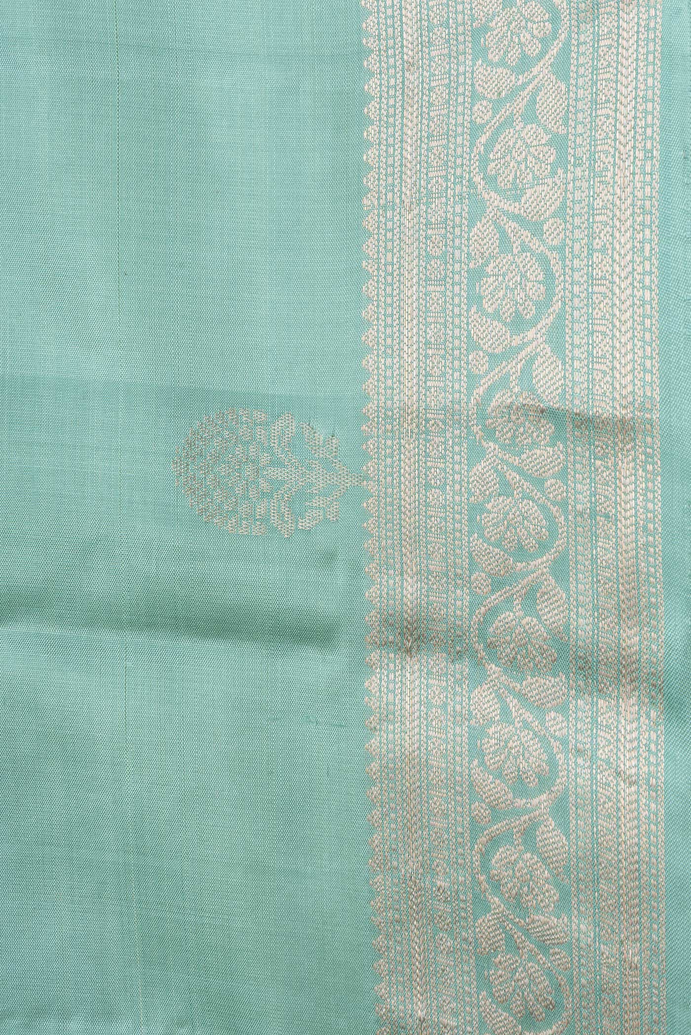 Border image of Sea Green Dual Tone Soft Silk Saree with Zari Butta on the body and Zari Border. 