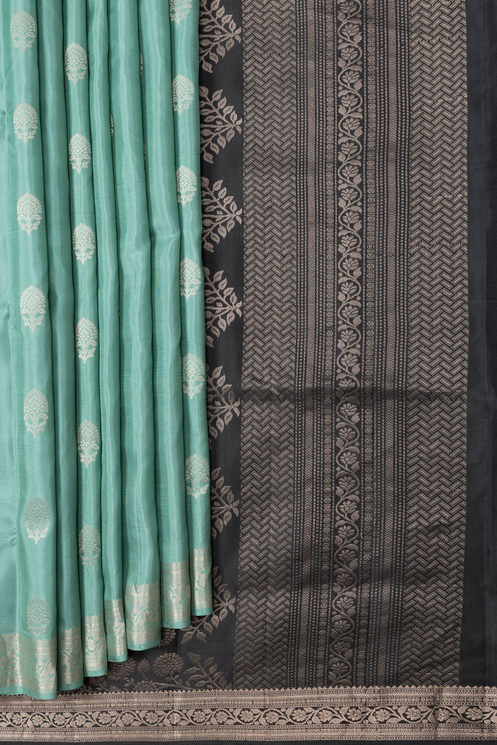 Pleats and pallu of Sea Green Dual Tone Soft Silk Saree with Zari Butta on the body and Zari Border. 