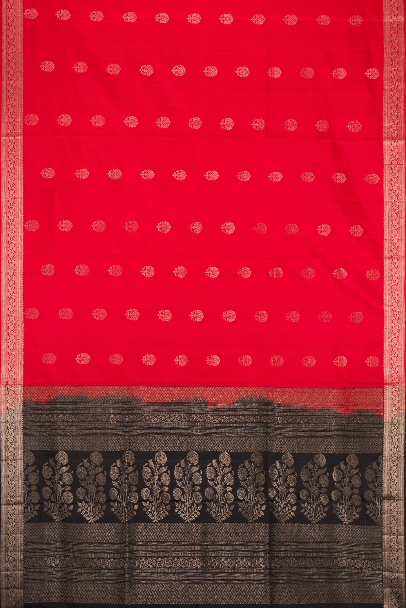 Flat view of Red Dual Tone Soft Silk Saree with Zari Butta on the body and Zari Border. 