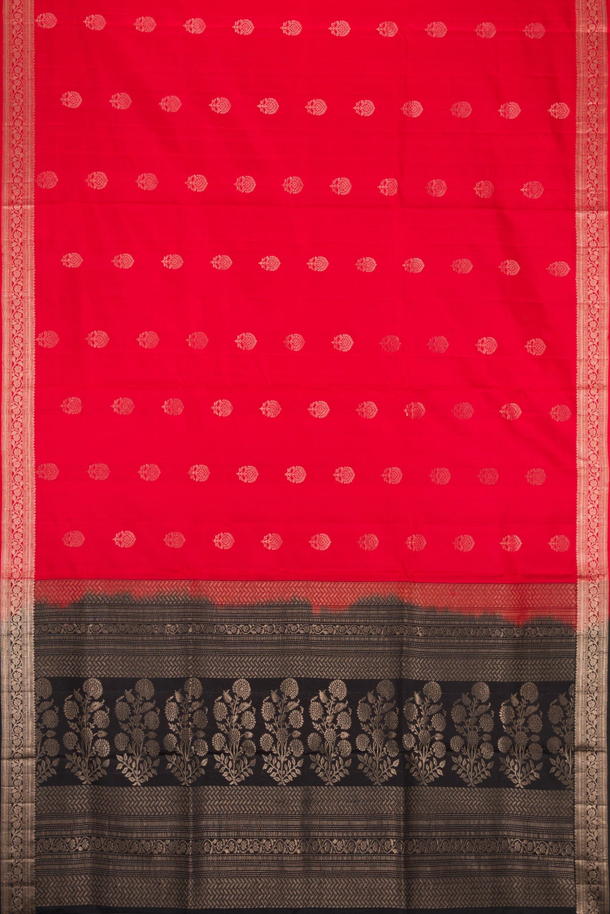 Flat view of Red Dual Tone Soft Silk Saree with Zari Butta on the body and Zari Border. 