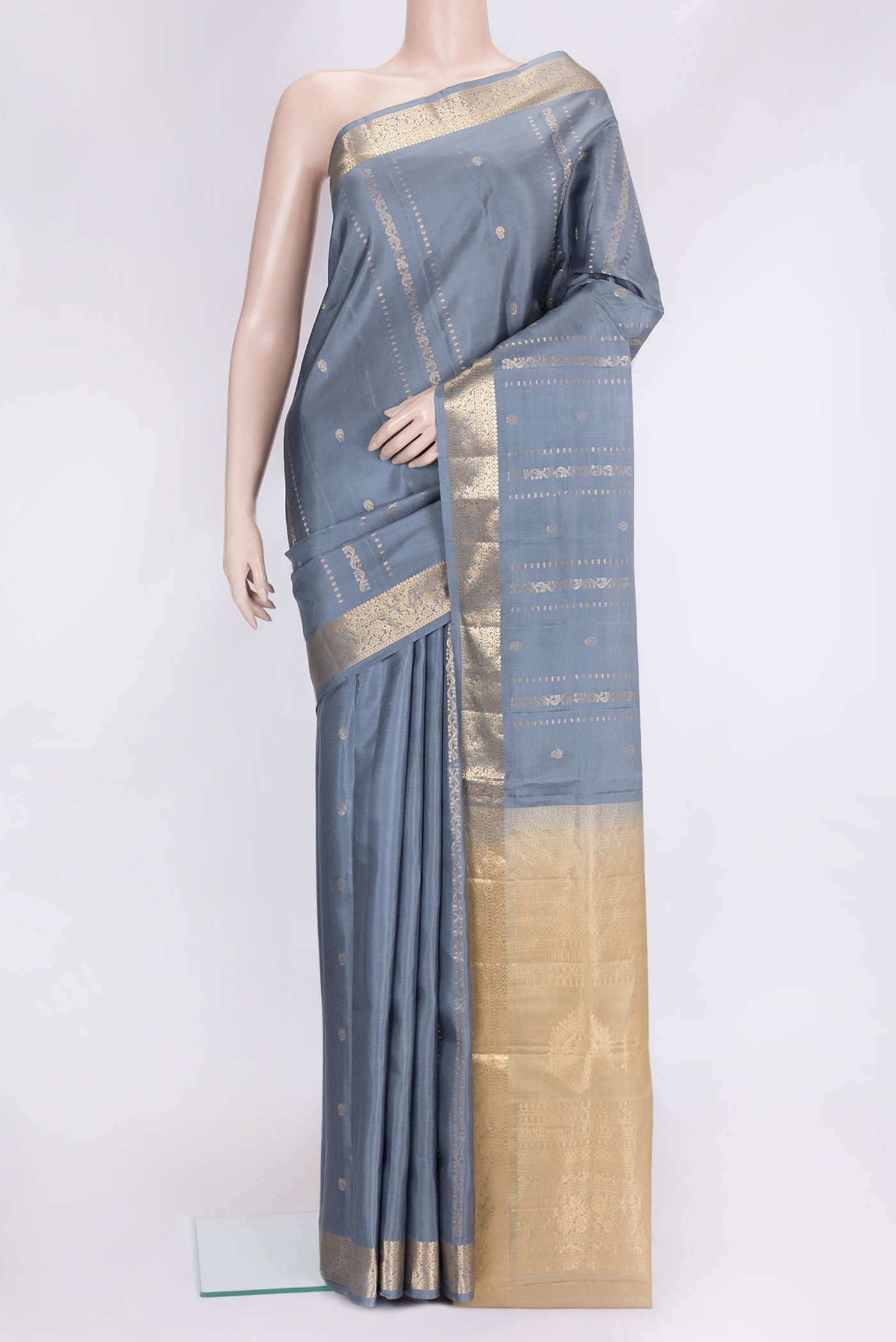 Grey Dual Tone Soft Silk Saree with Zari Butta on the body and Zari Border.  displayed on a mannequin