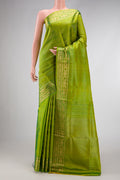 Green Dual Tone Soft Silk Saree with Zari Brocade on the body and Zari Border.  displayed on a mannequin