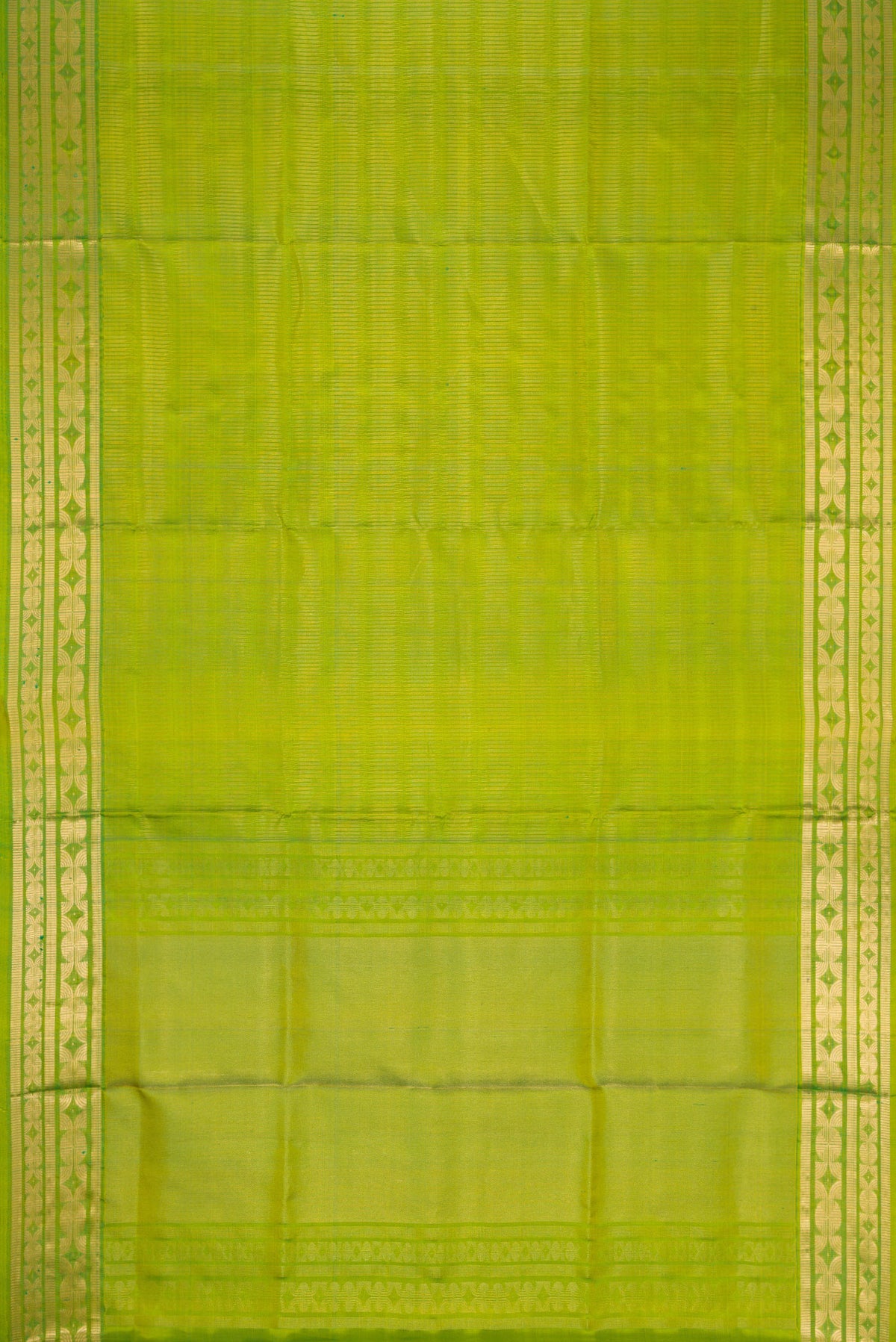 Flat view of Green Dual Tone Soft Silk Saree with Zari Brocade on the body and Zari Border. 