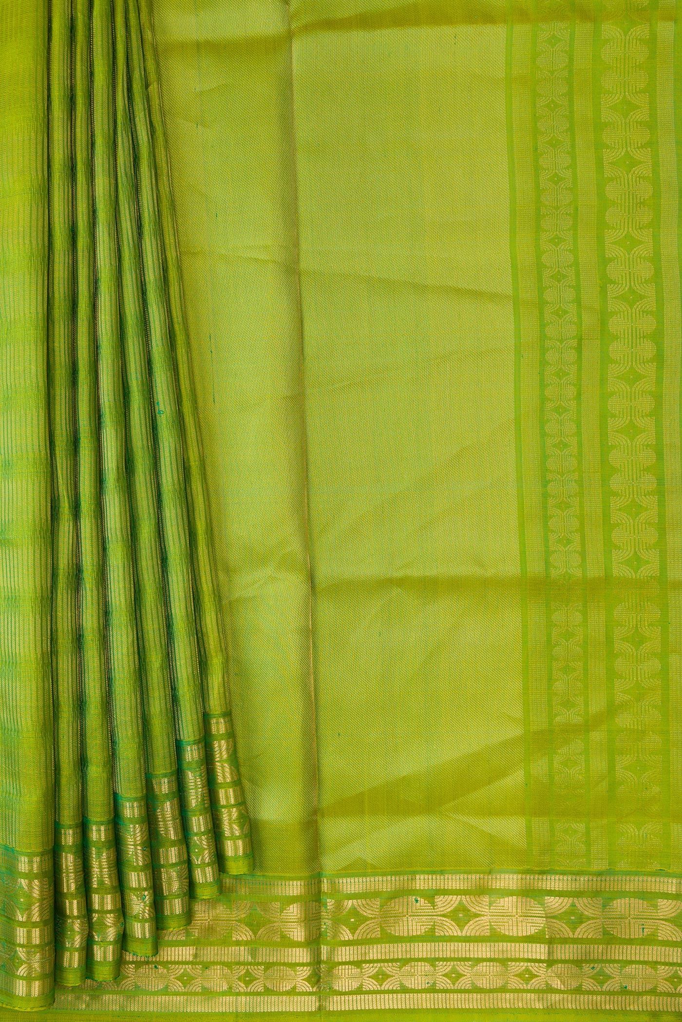 Pleats and pallu of Green Dual Tone Soft Silk Saree with Zari Brocade on the body and Zari Border. 