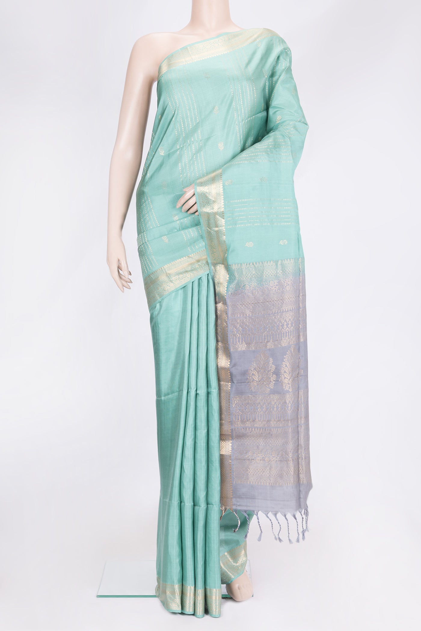 Sky Blue Dual Tone Soft Silk Saree with Zari Butta on the body and Zari Border.  displayed on a mannequin