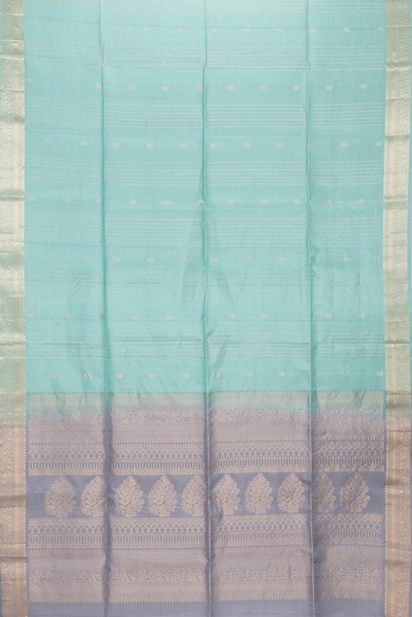 Flat view of Sky Blue Dual Tone Soft Silk Saree with Zari Butta on the body and Zari Border. 