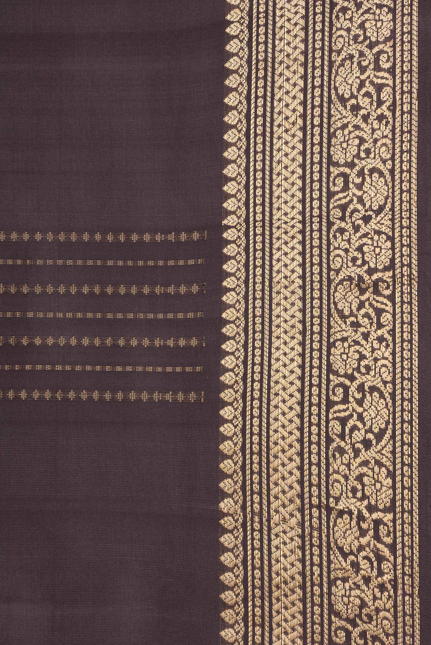 Border image of Brown Dual Tone Soft Silk Saree with Zari Butta on the body and Zari Border. 
