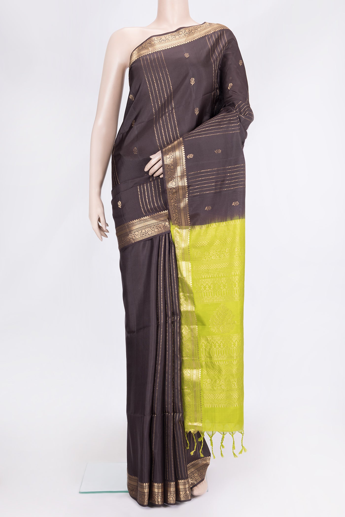 Brown Dual Tone Soft Silk Saree with Zari Butta on the body and Zari Border.  displayed on a mannequin