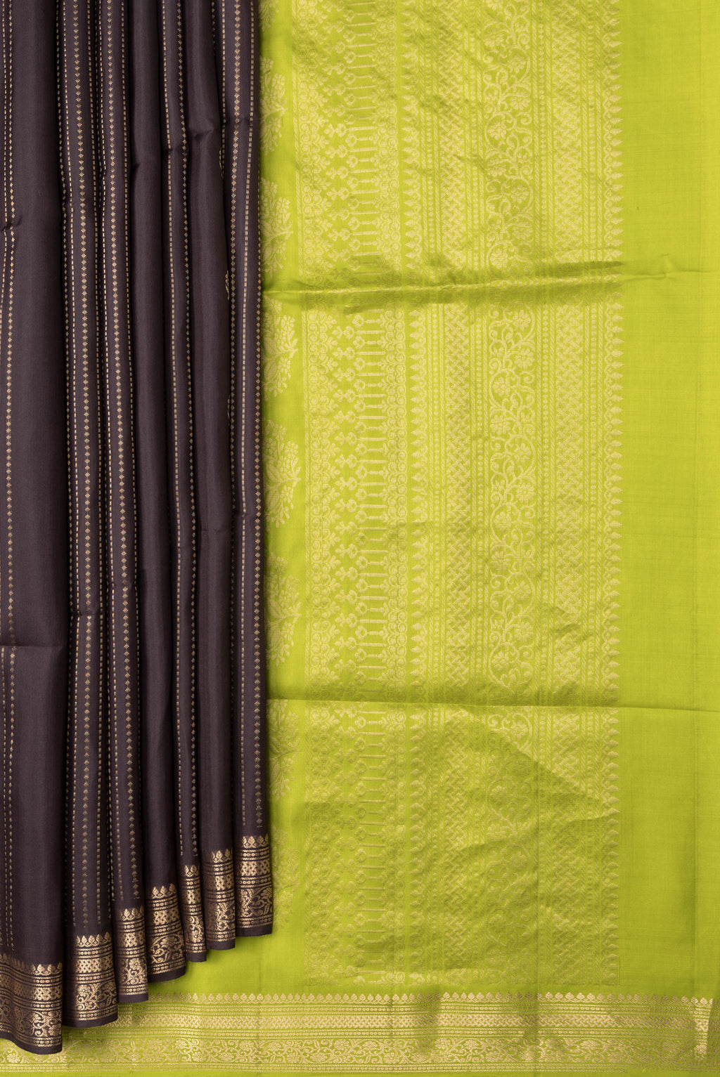 Pleats and pallu of Brown Dual Tone Soft Silk Saree with Zari Butta on the body and Zari Border. 