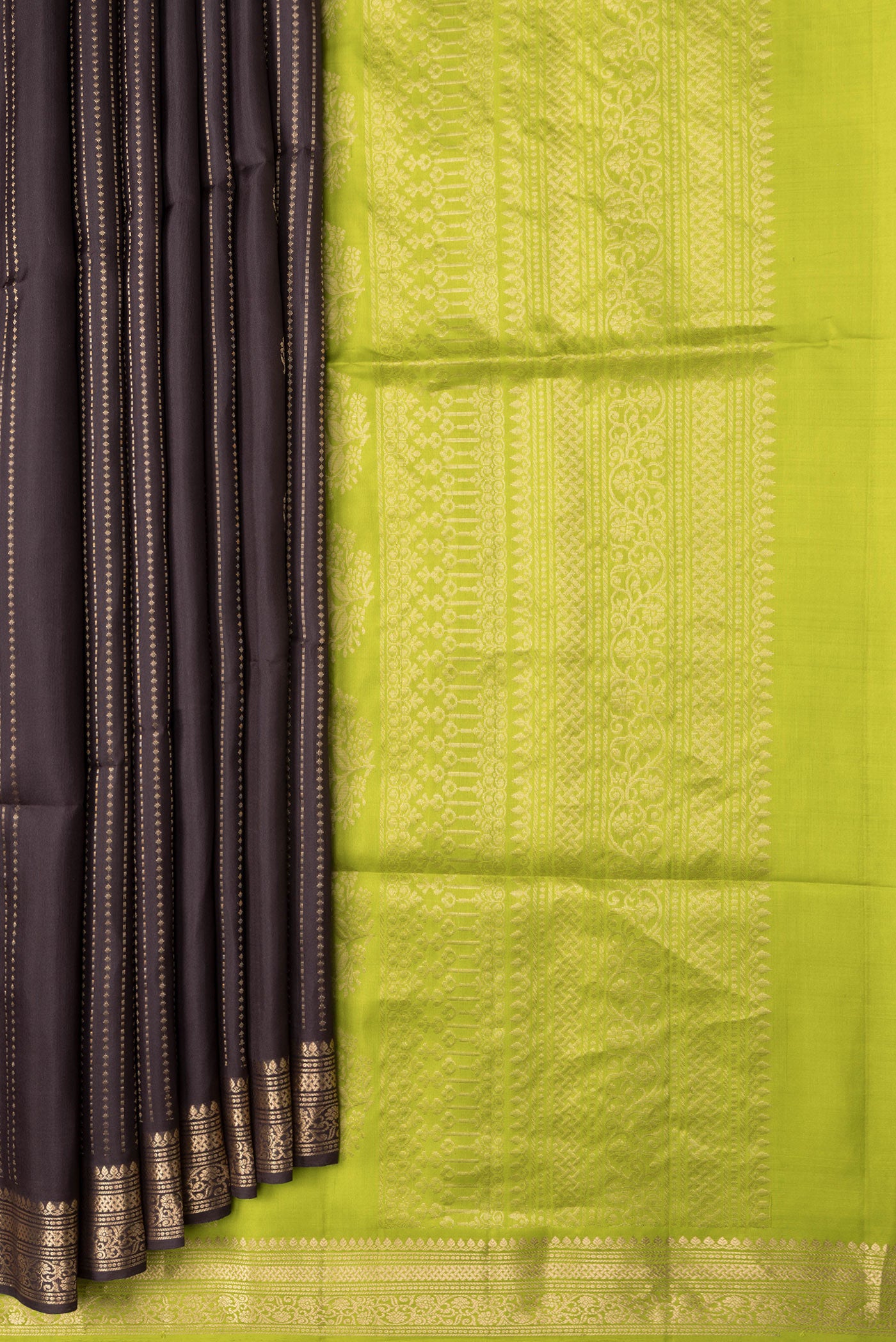Pleats and pallu of Brown Dual Tone Soft Silk Saree with Zari Butta on the body and Zari Border. 