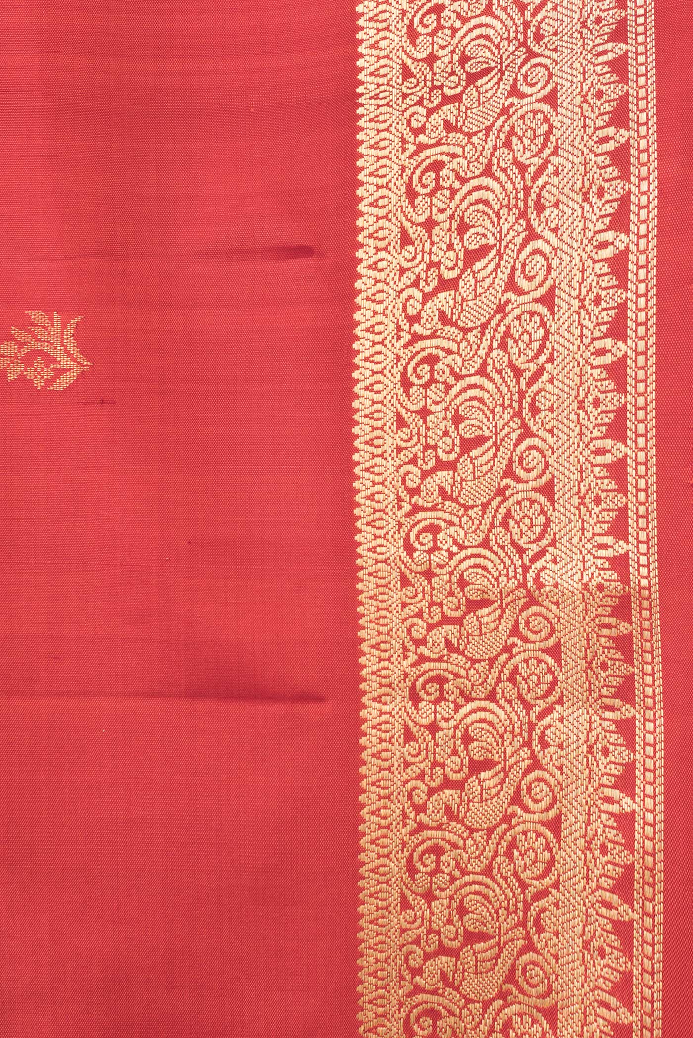 Border image of Brick Orange Dual Tone Soft Silk Saree with Zari Butta on the body and Zari Border. 