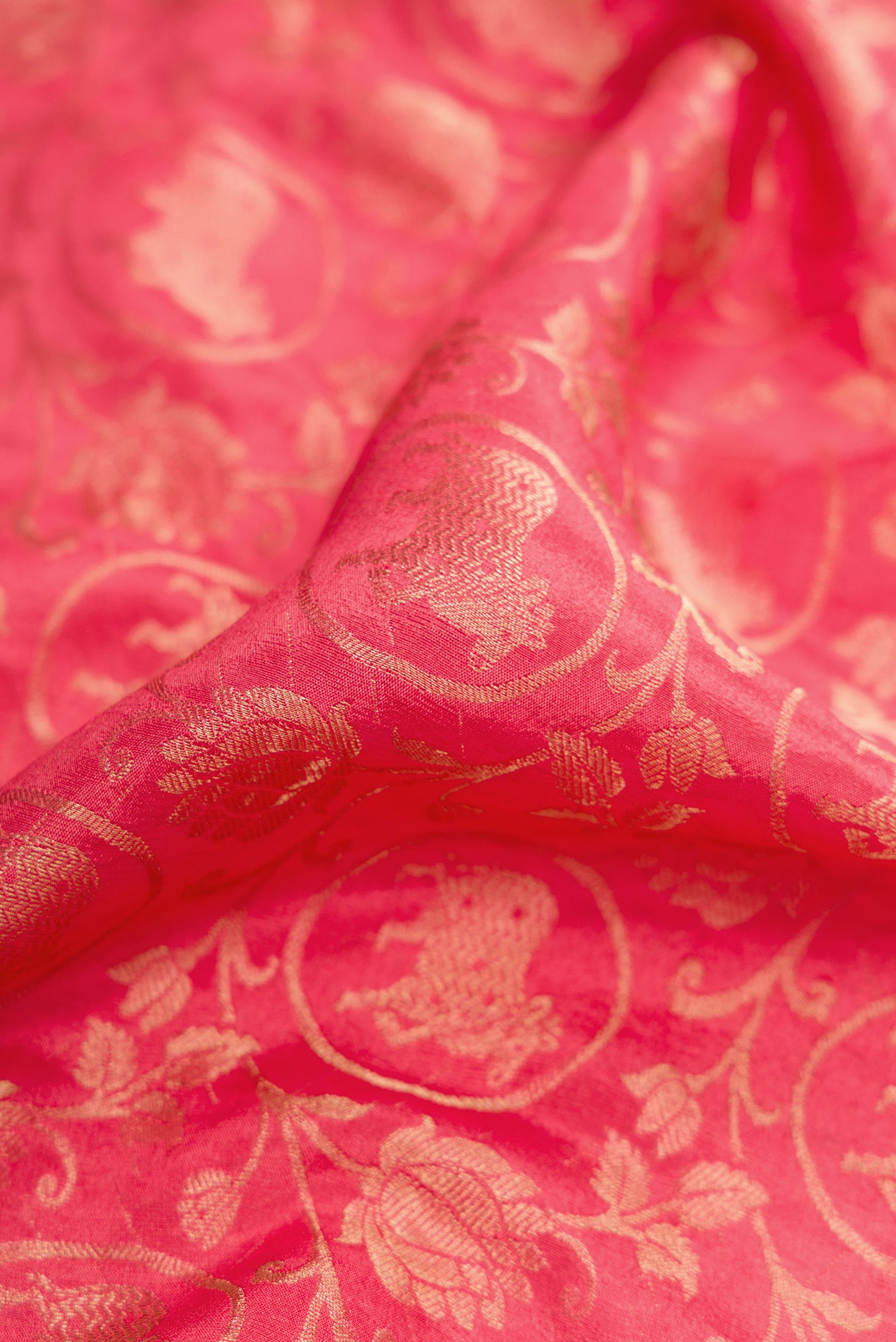 Close up of Dark Pink Dual Tone Mysore Silk Saree with Zari Brocade on the body and Zari Border.  displaying folds