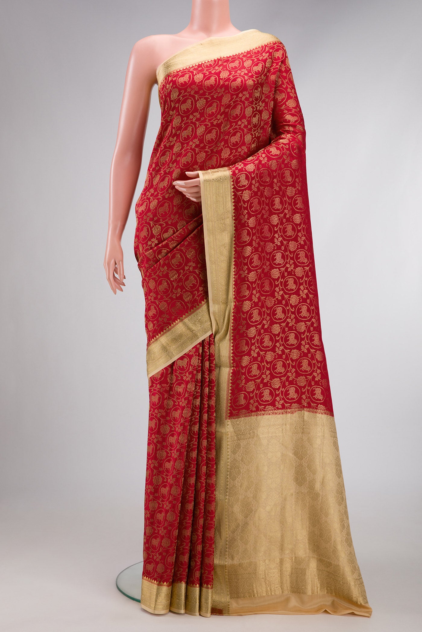 Red Dual Tone Mysore Silk Saree with Zari Brocade on the body and Zari Border.  displayed on a mannequin