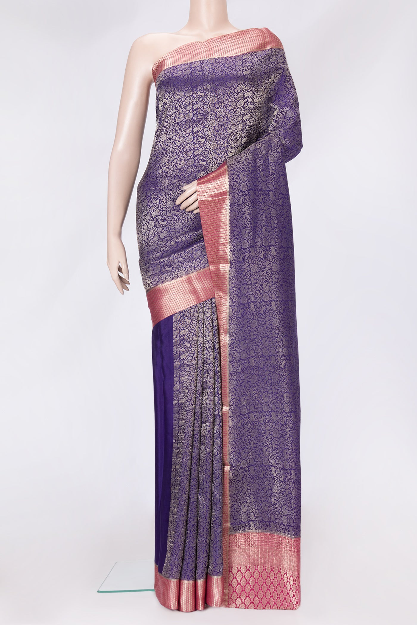 Navy Blue Dual Tone Tussar Silk Saree with Zari Brocade on the body and Zari Border.  displayed on a mannequin