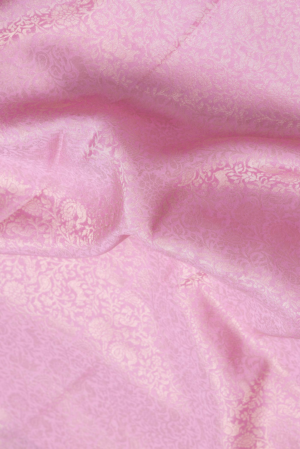 Close up of Pink Dual Tone Mysore Silk Saree with Zari Brocade on the body and Zari Border.  displaying folds