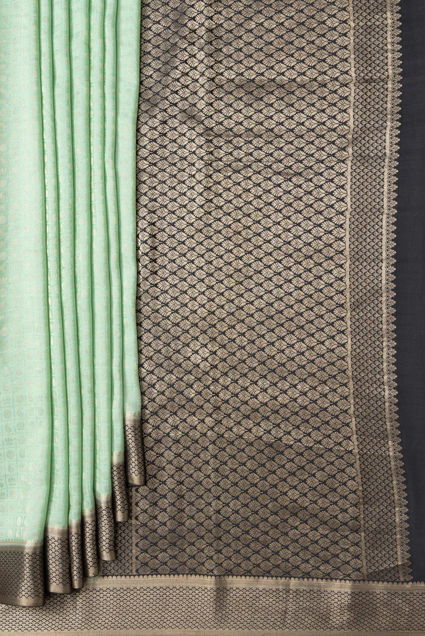 Pleats and pallu of Pista Green Dual Tone Tussar Silk Saree with Zari Brocade on the body and Zari Border. 