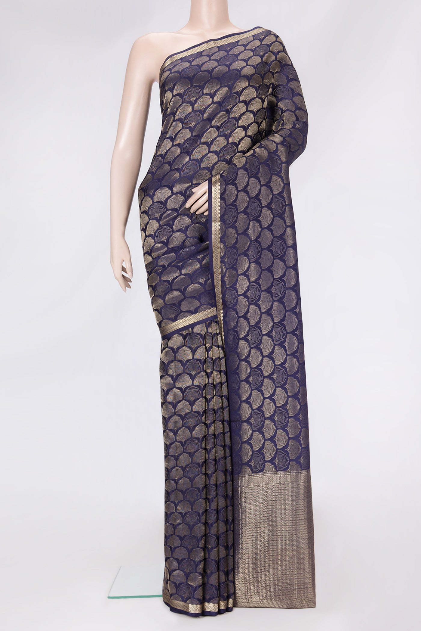 Navy Blue Dual Tone Tussar Silk Saree with Zari Brocade on the body and Zari Border.  displayed on a mannequin