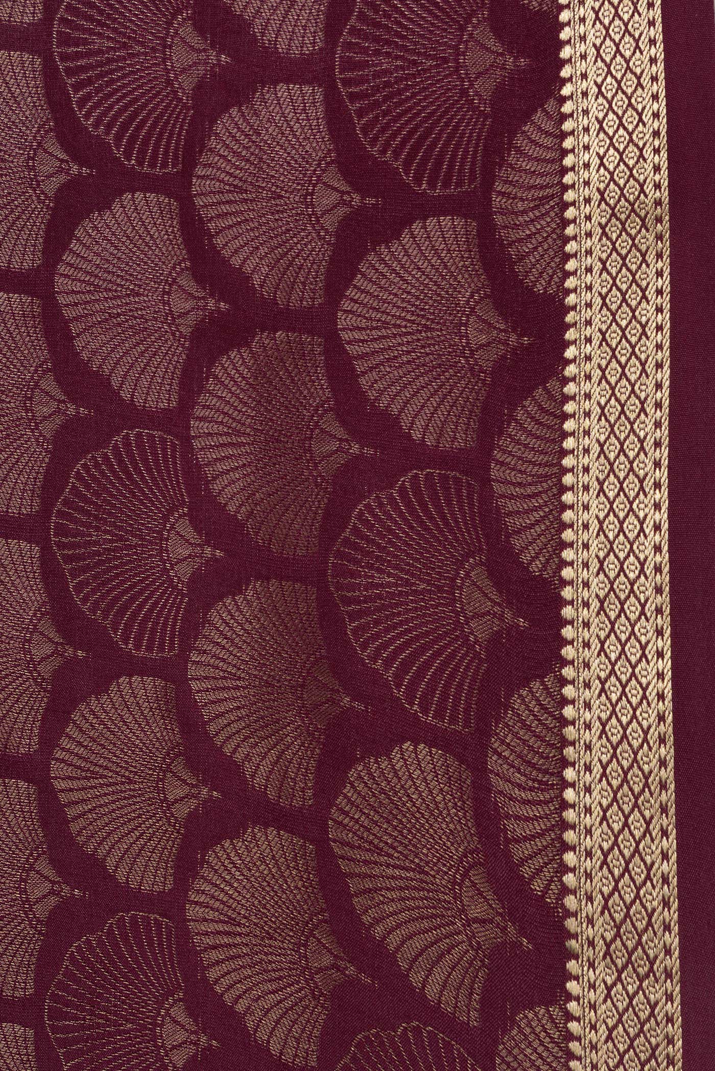 Border image of Maroon Dual Tone Tussar Silk Saree with Zari Brocade on the body and Zari Border. 