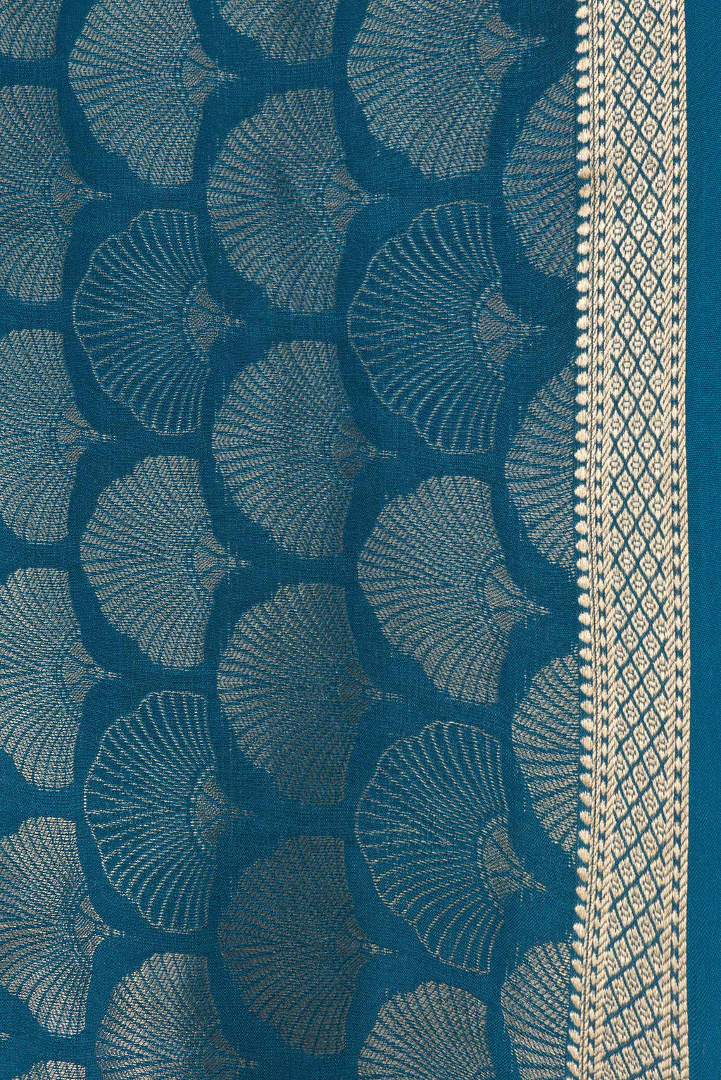 Border image of Peacock Blue Dual Tone Tussar Silk Saree with Zari Brocade on the body and Zari Border. 