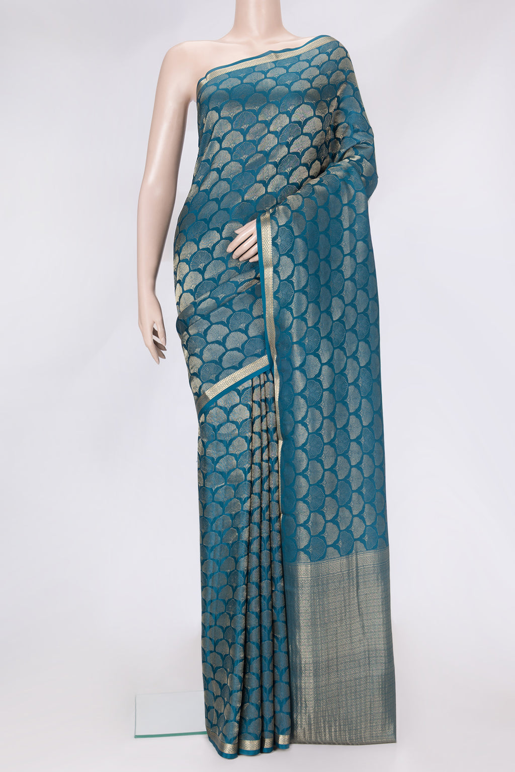 Peacock Blue Dual Tone Tussar Silk Saree with Zari Brocade on the body and Zari Border.  displayed on a mannequin