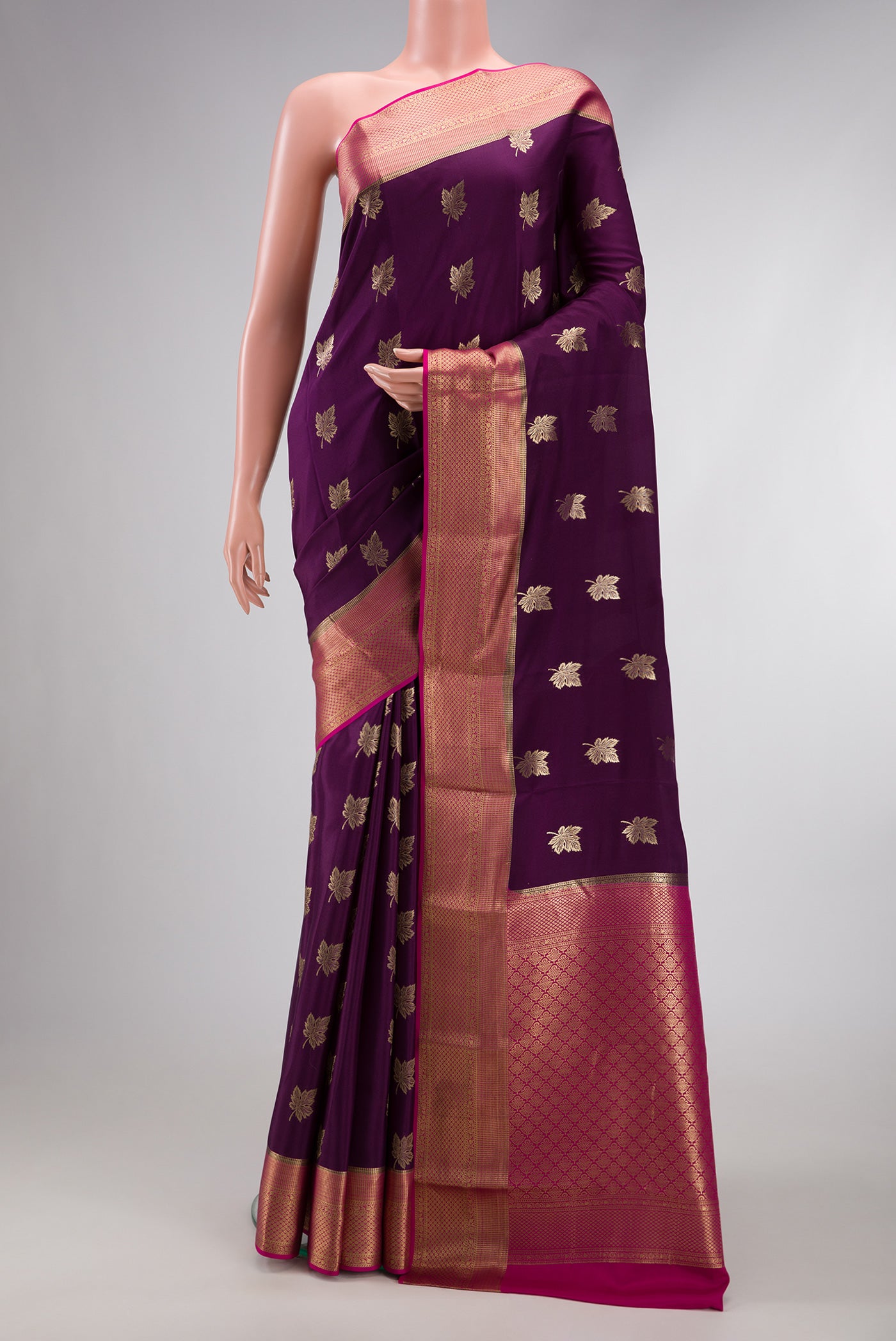 Burgundy Dual Tone Mysore Silk Saree with Zari Butta on the body and Zari Border.  displayed on a mannequin