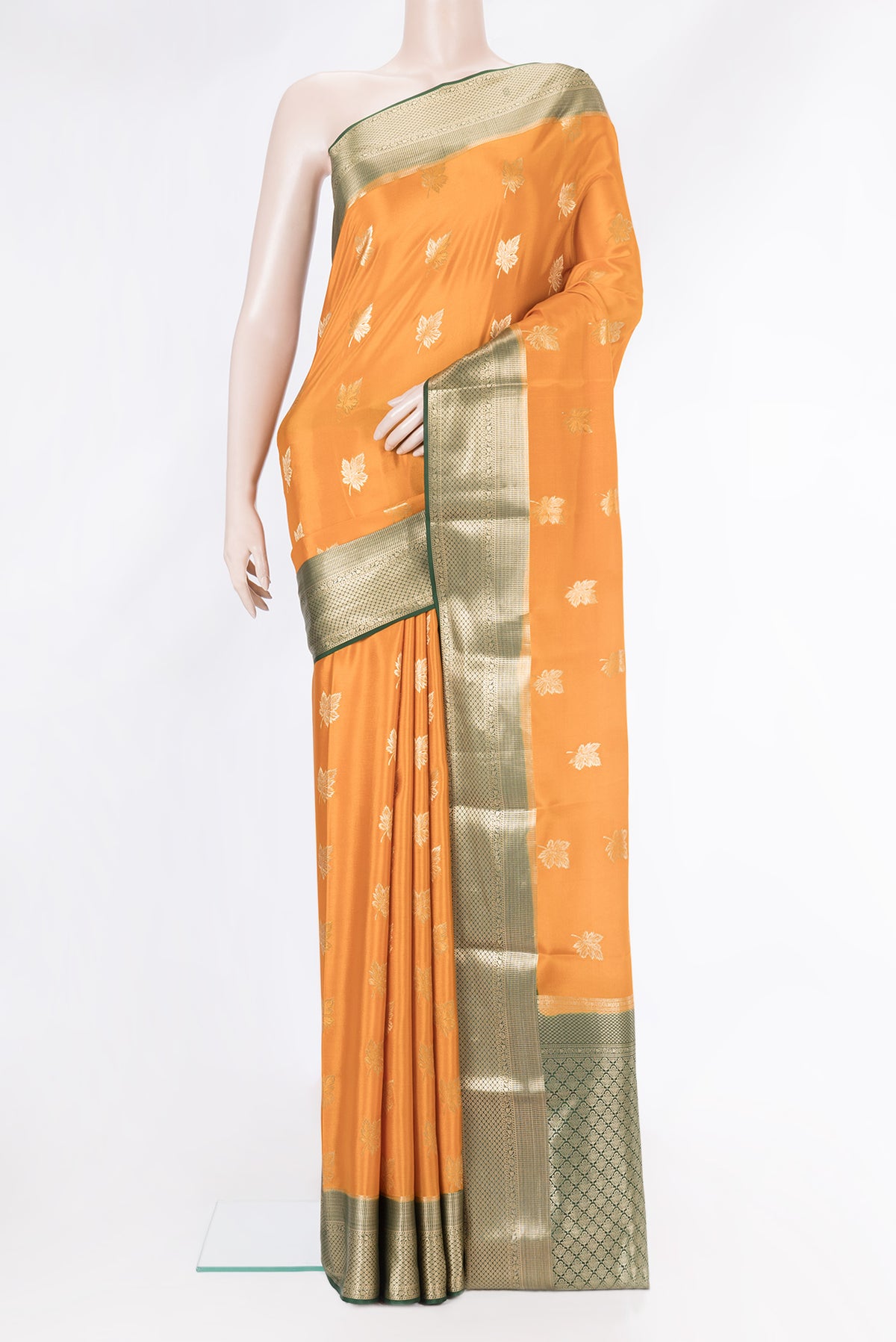 Orange Dual Tone Mysore Silk Saree with Zari Butta on the body and Zari Border.  displayed on a mannequin