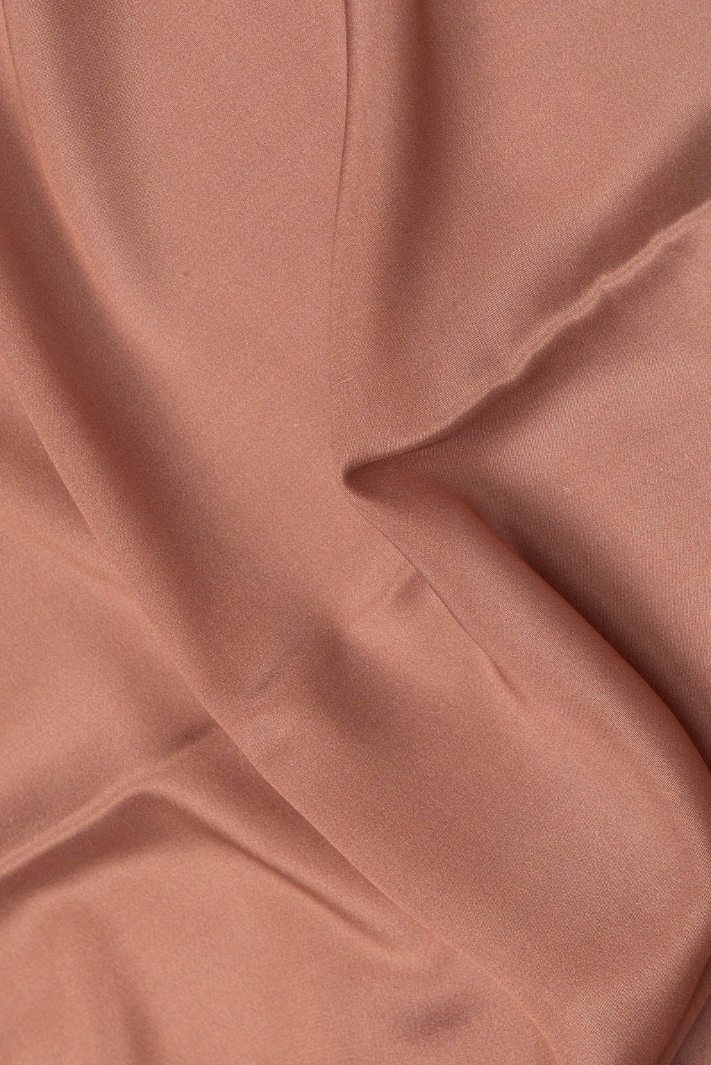 Close up of Brown Dual Tone Mysore Silk Saree with Plain Body and Fancy Border.  displaying folds