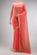 Peach Dual Tone Mysore Chiffon Saree with Plain Body and Zari Border.  displayed on a mannequin