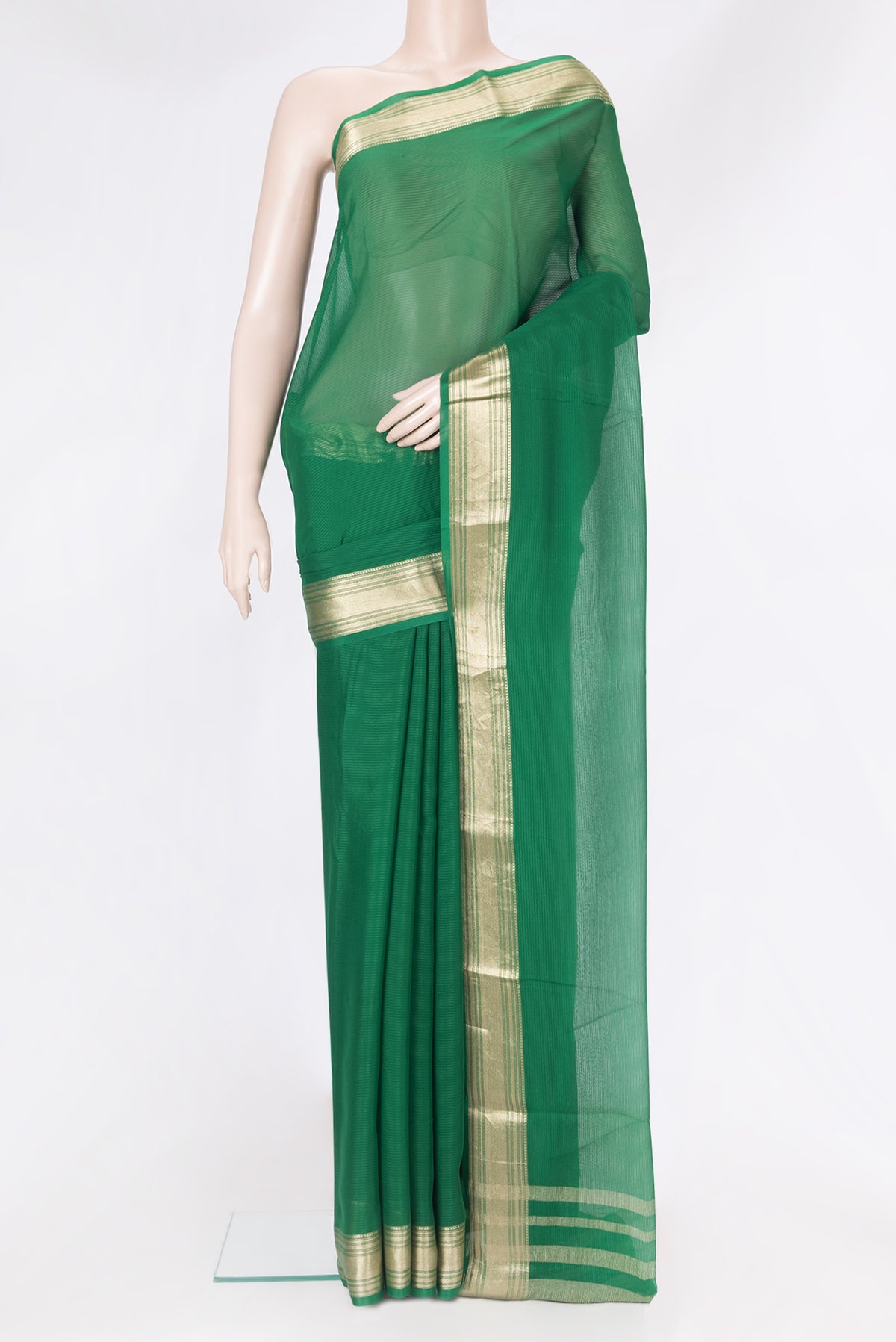 Green Georgette Saree with Stripes on the body and Zari Border.  displayed on a mannequin