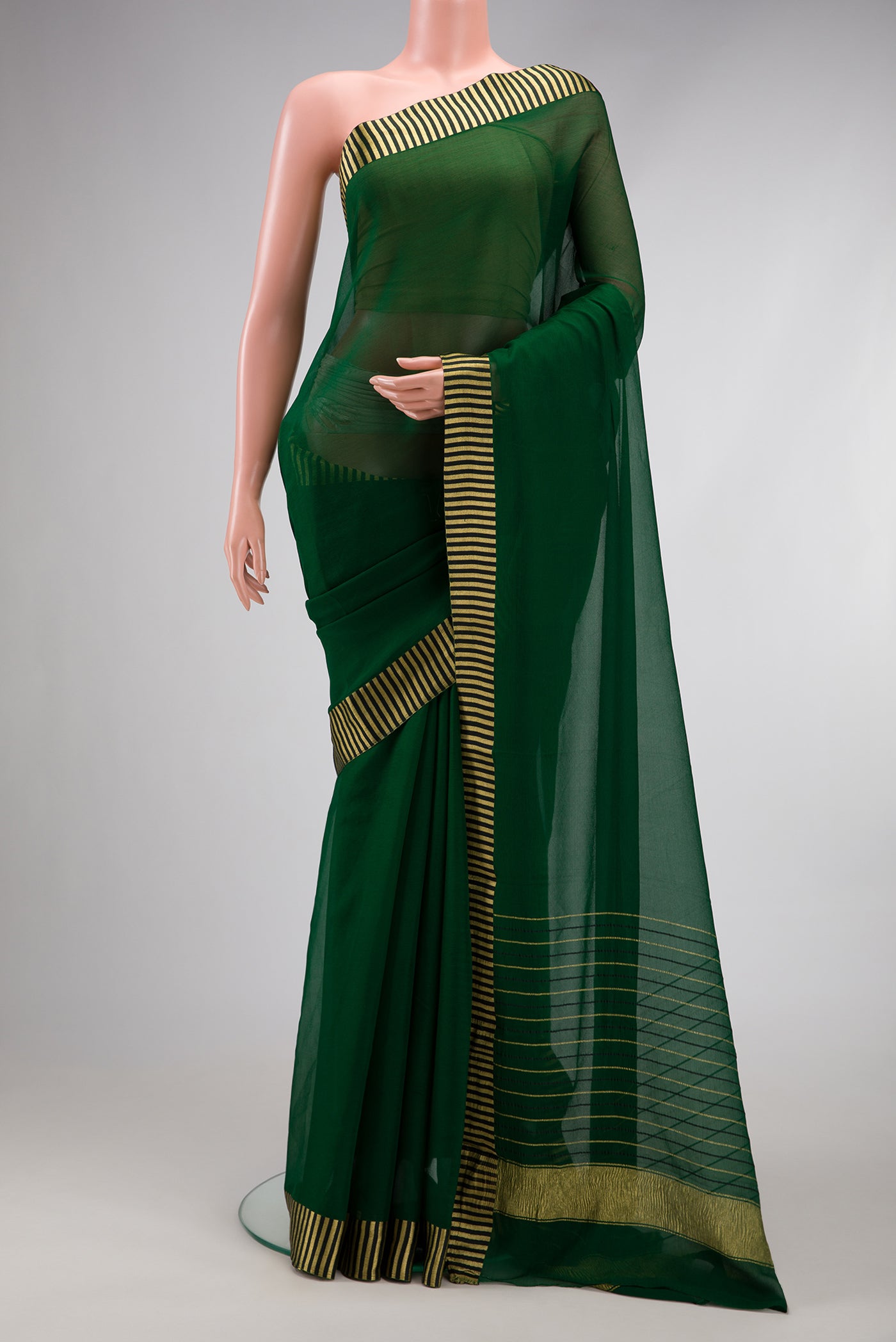 Bottle Green Mysore Chiffon Saree with Plain Body and Fancy Border.  displayed on a mannequin