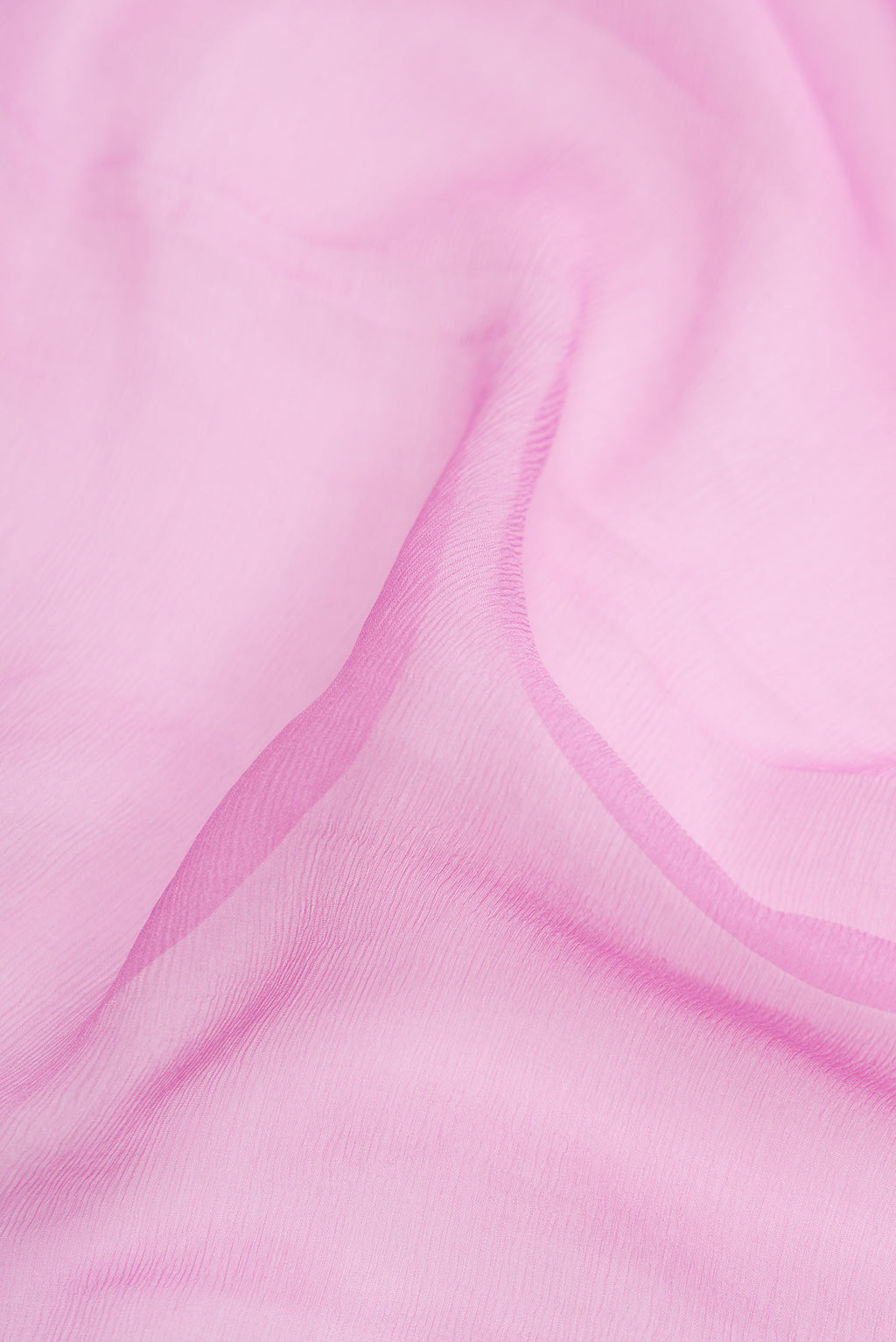 Close up of Lavender Dual Tone Mysore Chiffon Saree with Plain Body and Zari Border.  displaying folds
