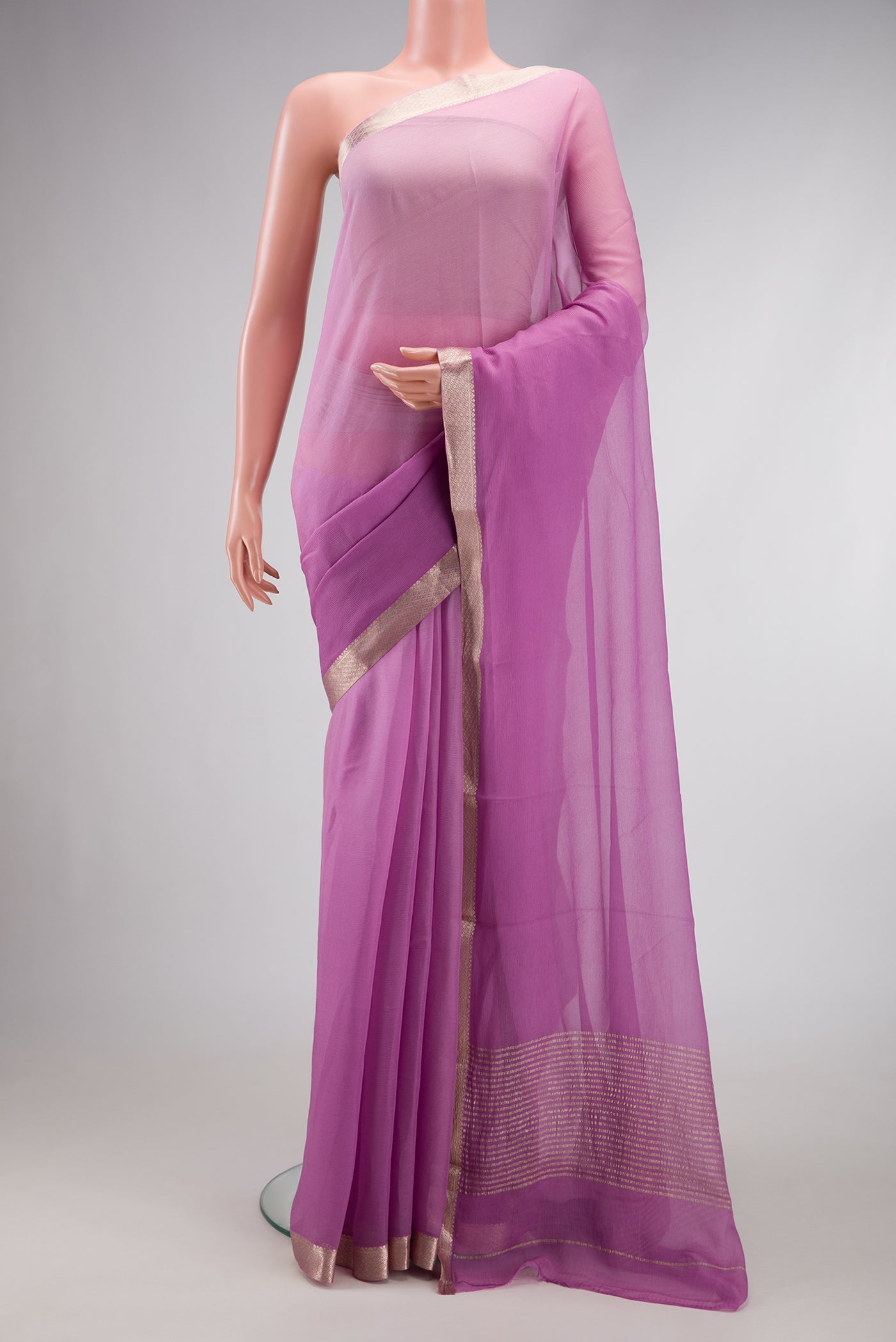Lavender Dual Tone Mysore Chiffon Saree with Plain Body and Zari Border.  displayed on a mannequin
