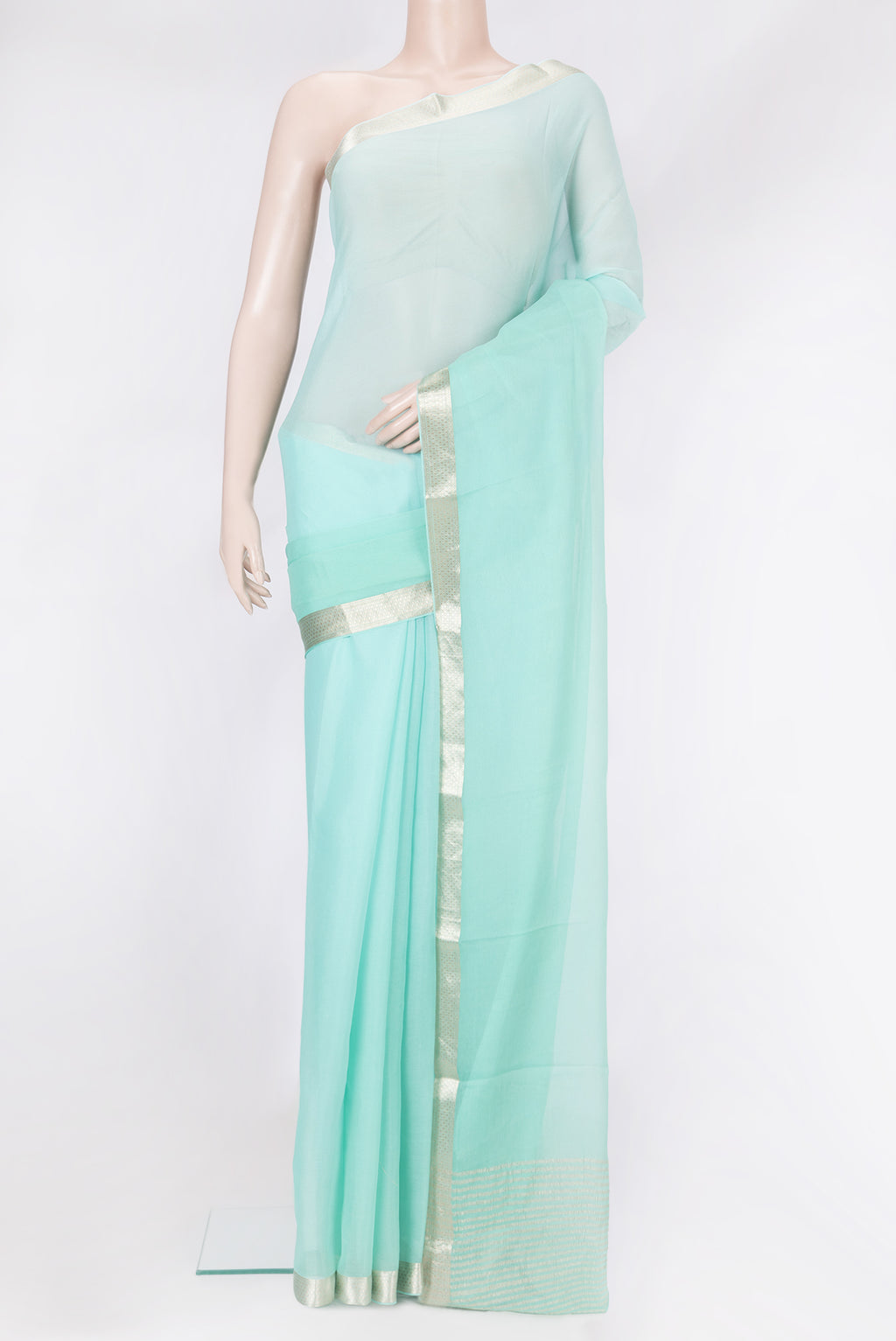 Sky Blue Mysore Chiffon Saree with Plain Body and Zari Border.  displayed on a mannequin