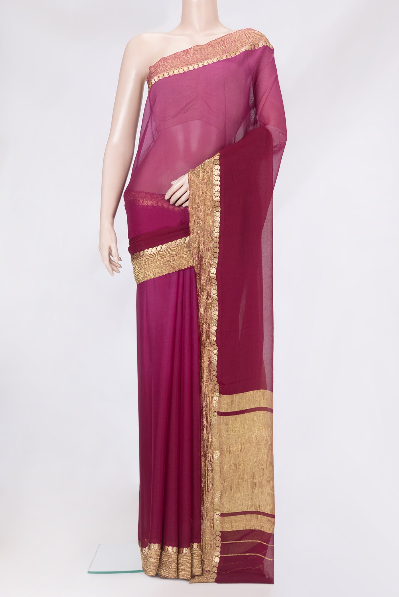 Maroon Mysore Chiffon Saree with Plain Body and Zari Border.  displayed on a mannequin