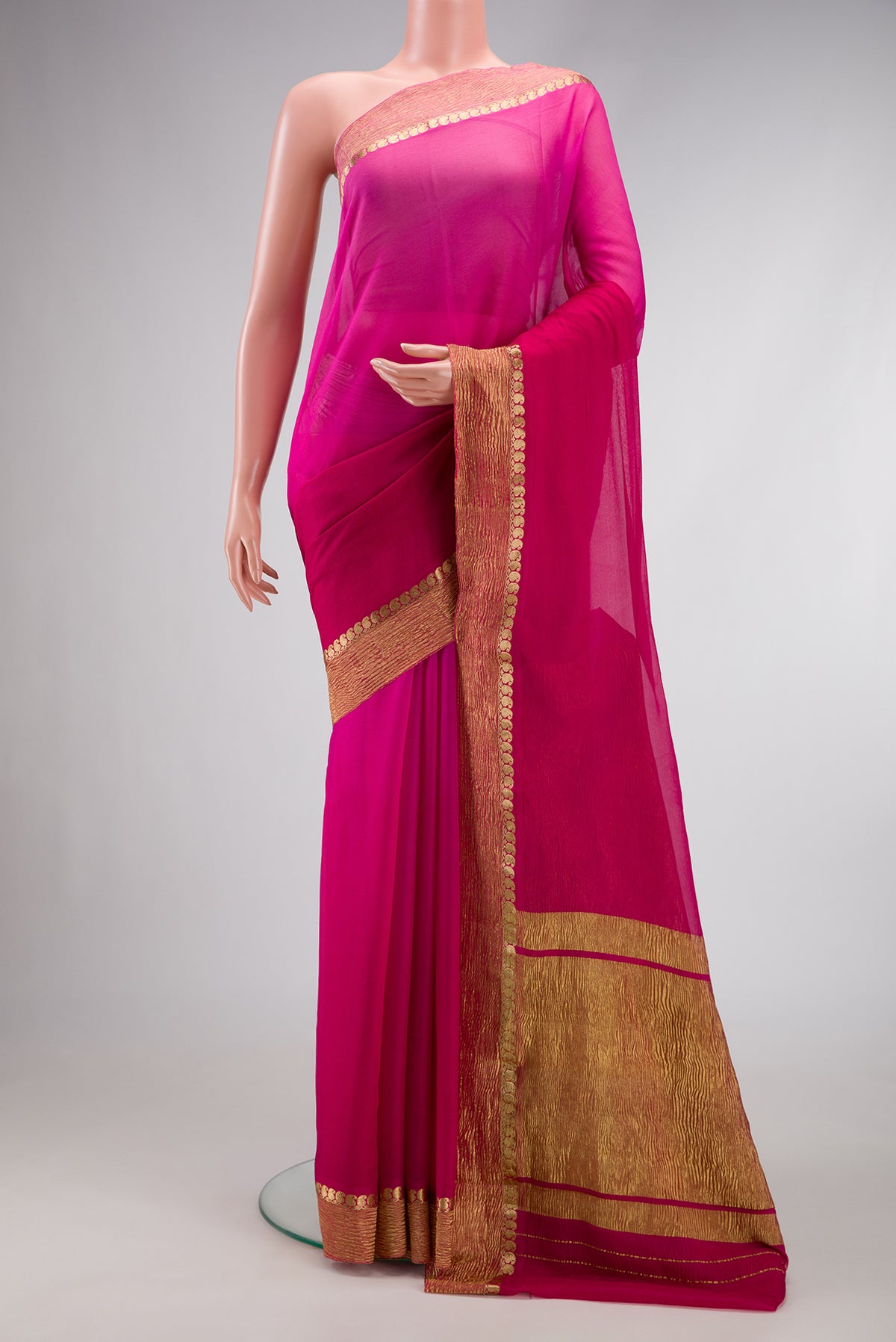 Pink Dual Tone Mysore Chiffon Saree with Plain Body and Zari Border.  displayed on a mannequin