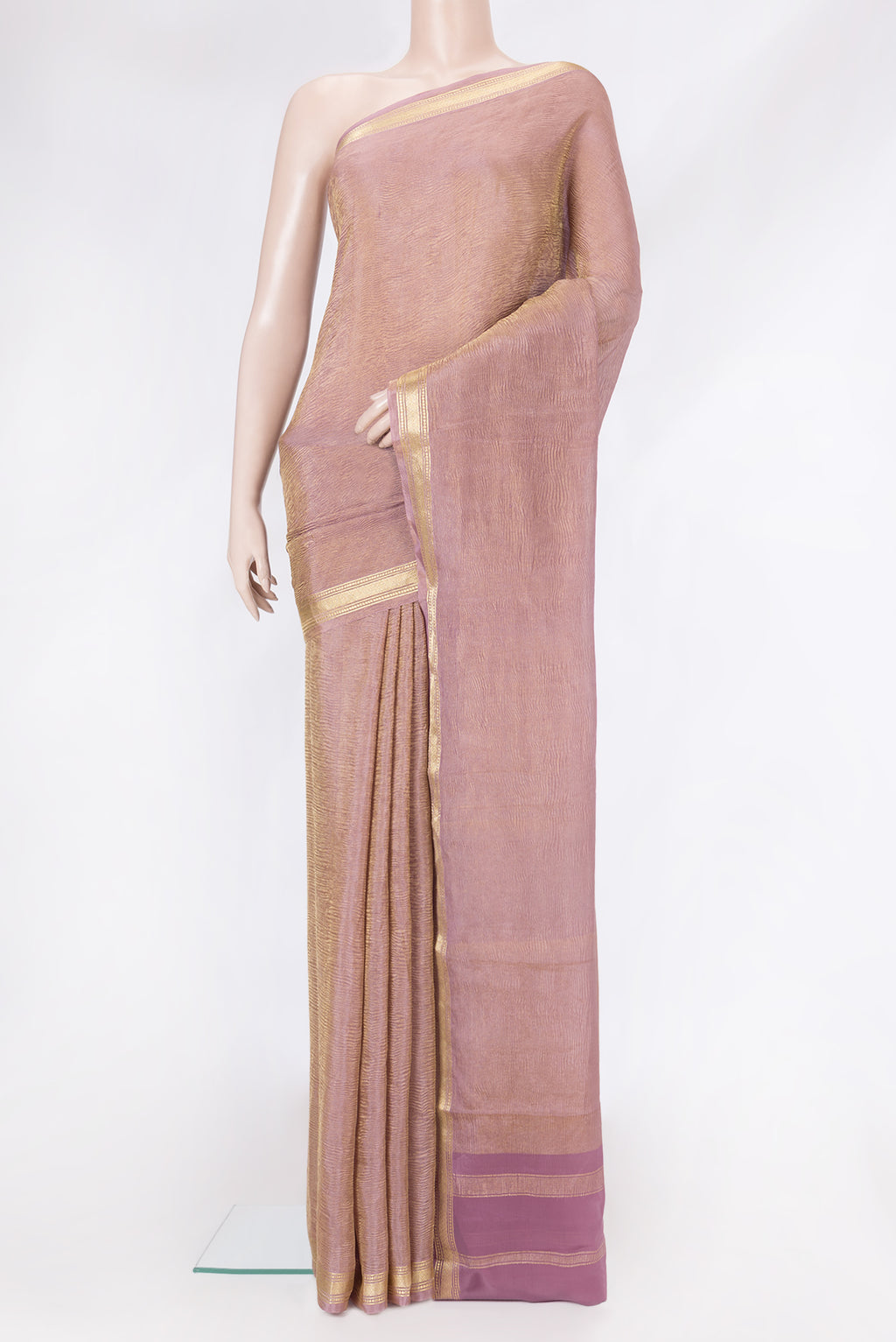 Rose Gold Dual Tone Mysore Georgette Saree with Plain Body and Zari Border.  displayed on a mannequin