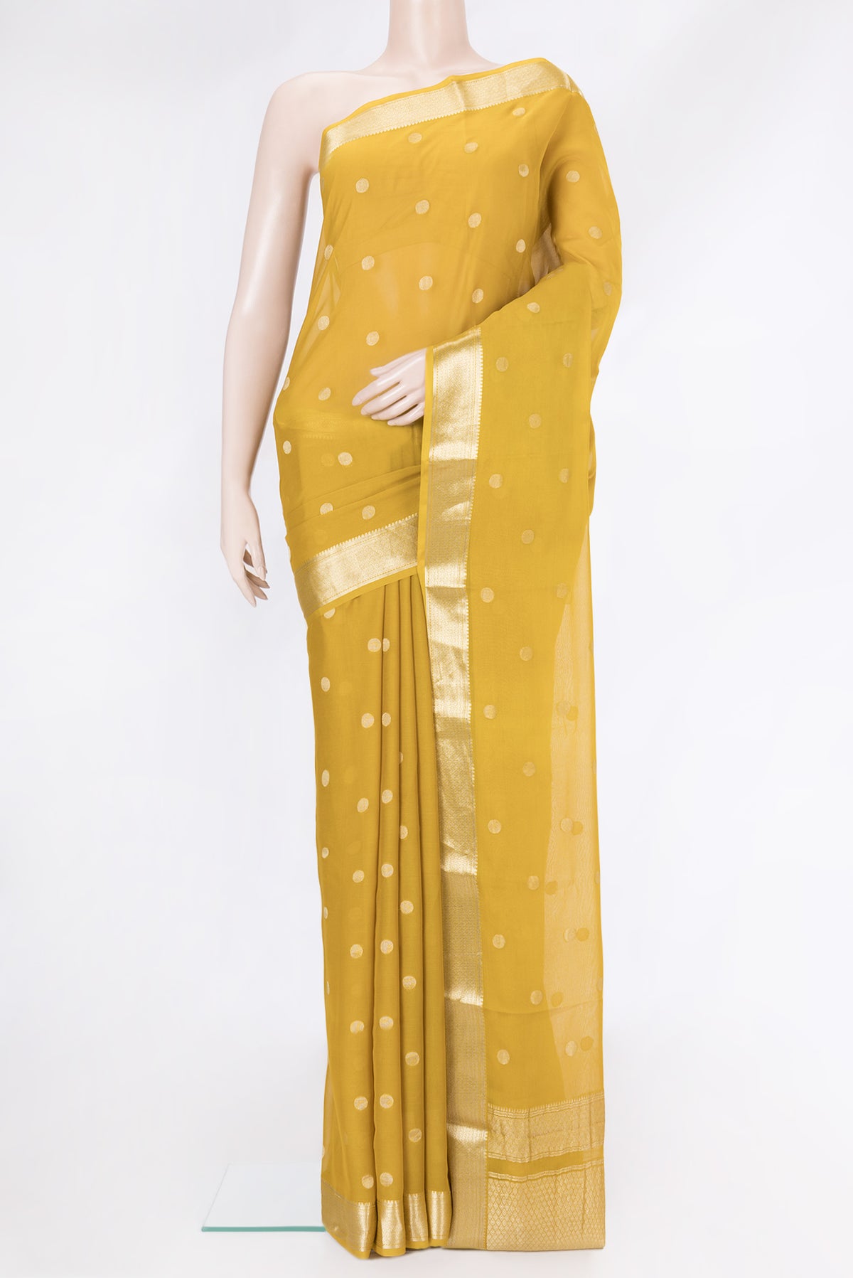 Mustard Dual Tone Mysore Georgette Saree with Zari Butta on the body and Zari Border.  displayed on a mannequin