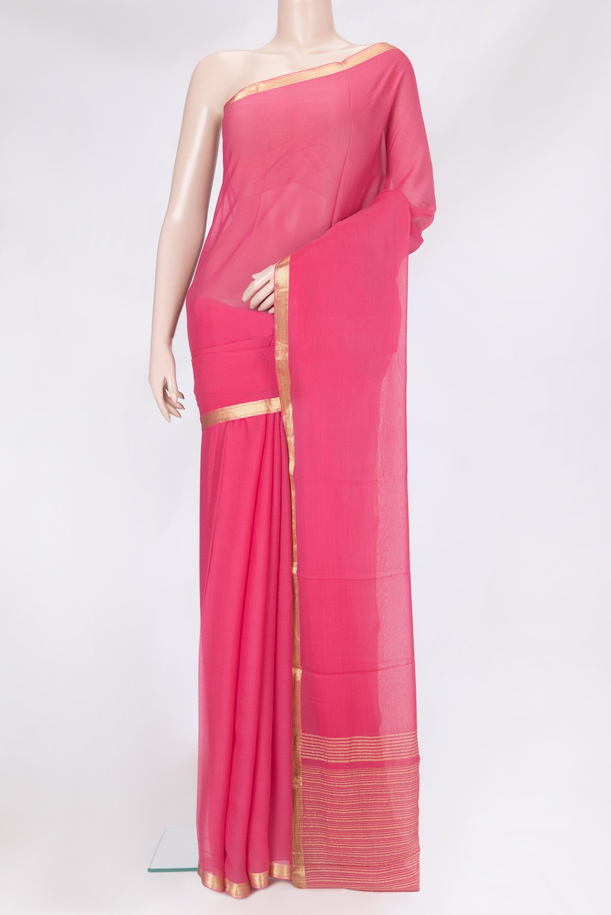 Pink Mysore Georgette Saree with Plain Body and Zari Border.  displayed on a mannequin