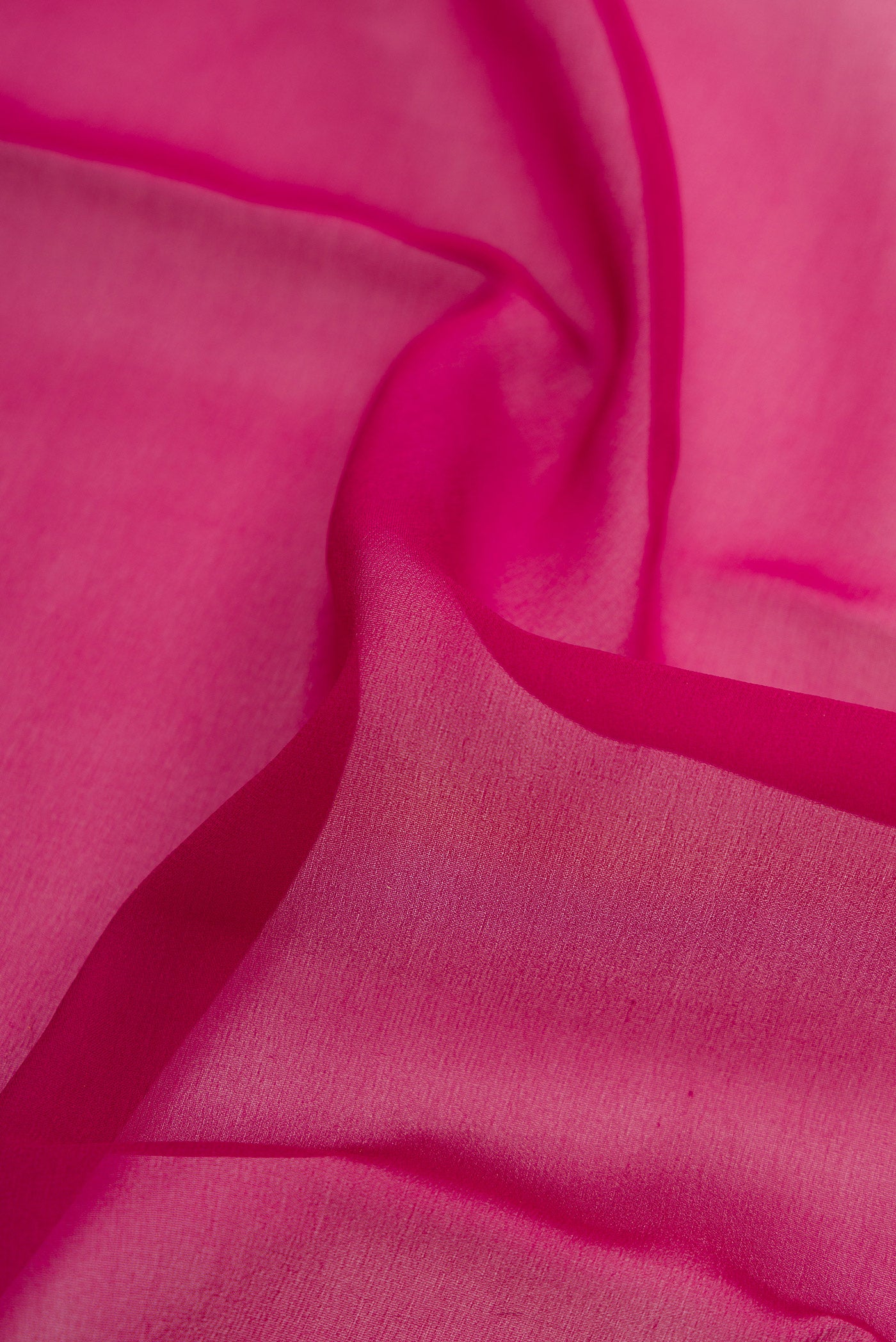 Close up of Beige and Off White Dual Tone Mysore Georgette Saree with Plain Body and Zari Border.  displaying folds