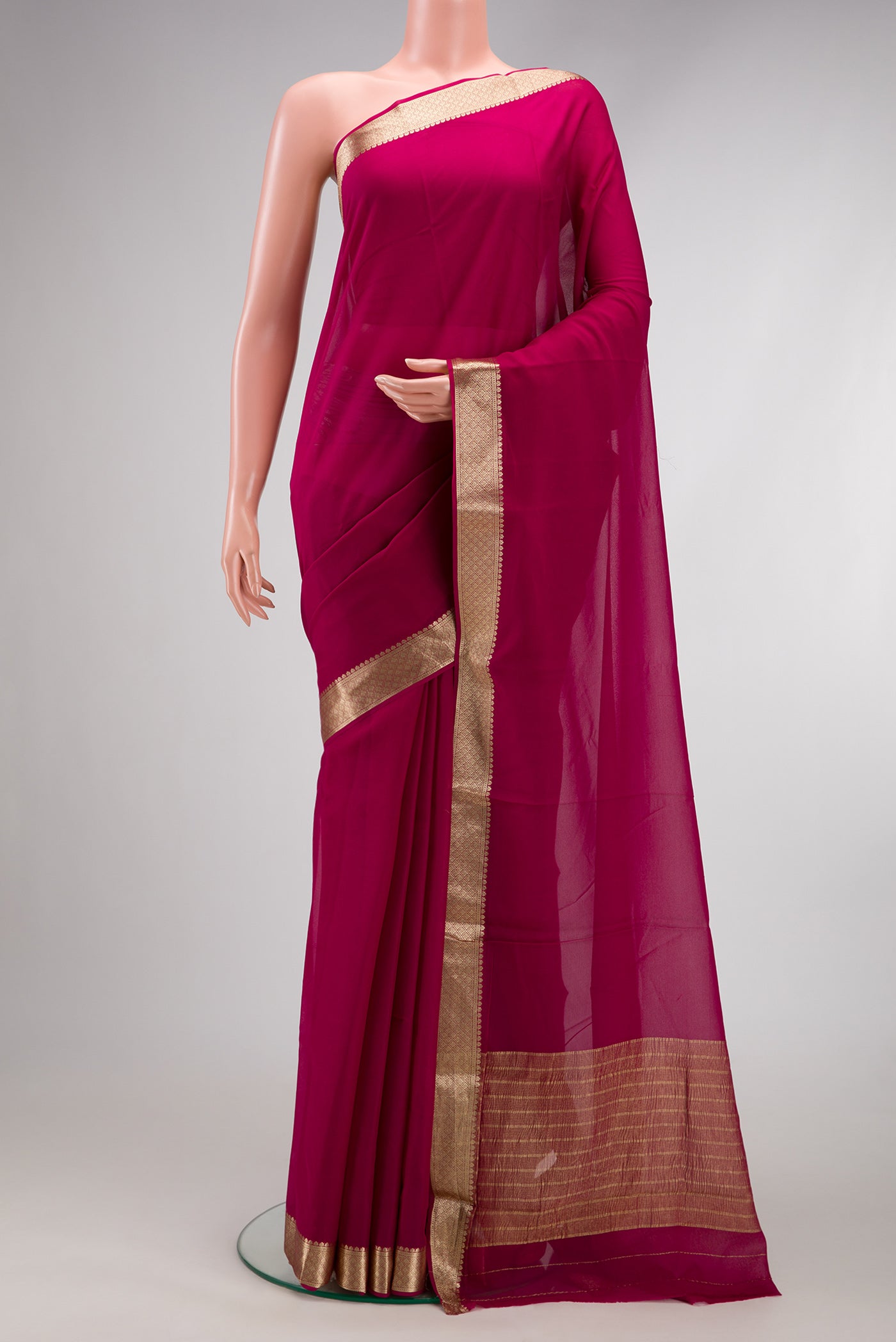 Beige and Off White Dual Tone Mysore Georgette Saree with Plain Body and Zari Border.  displayed on a mannequin
