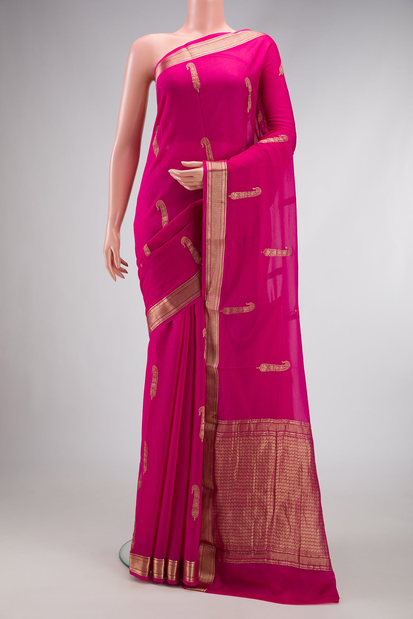 Pink Dual Tone Mysore Georgette Saree with Zari Butta on the body and Zari Border.  displayed on a mannequin