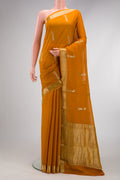 Mustard Dual Tone Mysore Georgette Saree with Zari Butta on the body and Zari Border.  displayed on a mannequin