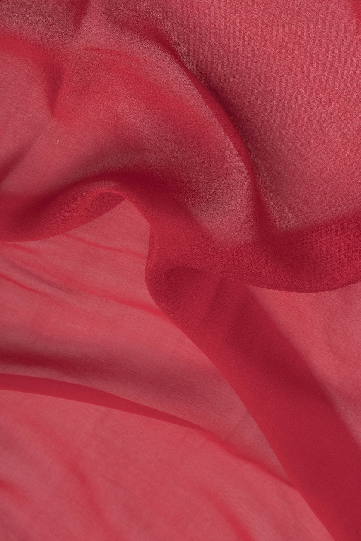Close up of Red Mysore Chiffon Saree with Zari Butta on the body and Zari Border.  displaying folds